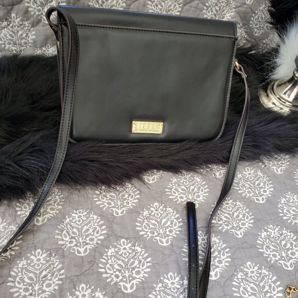 Black Steve Madden shoulder strap purse.